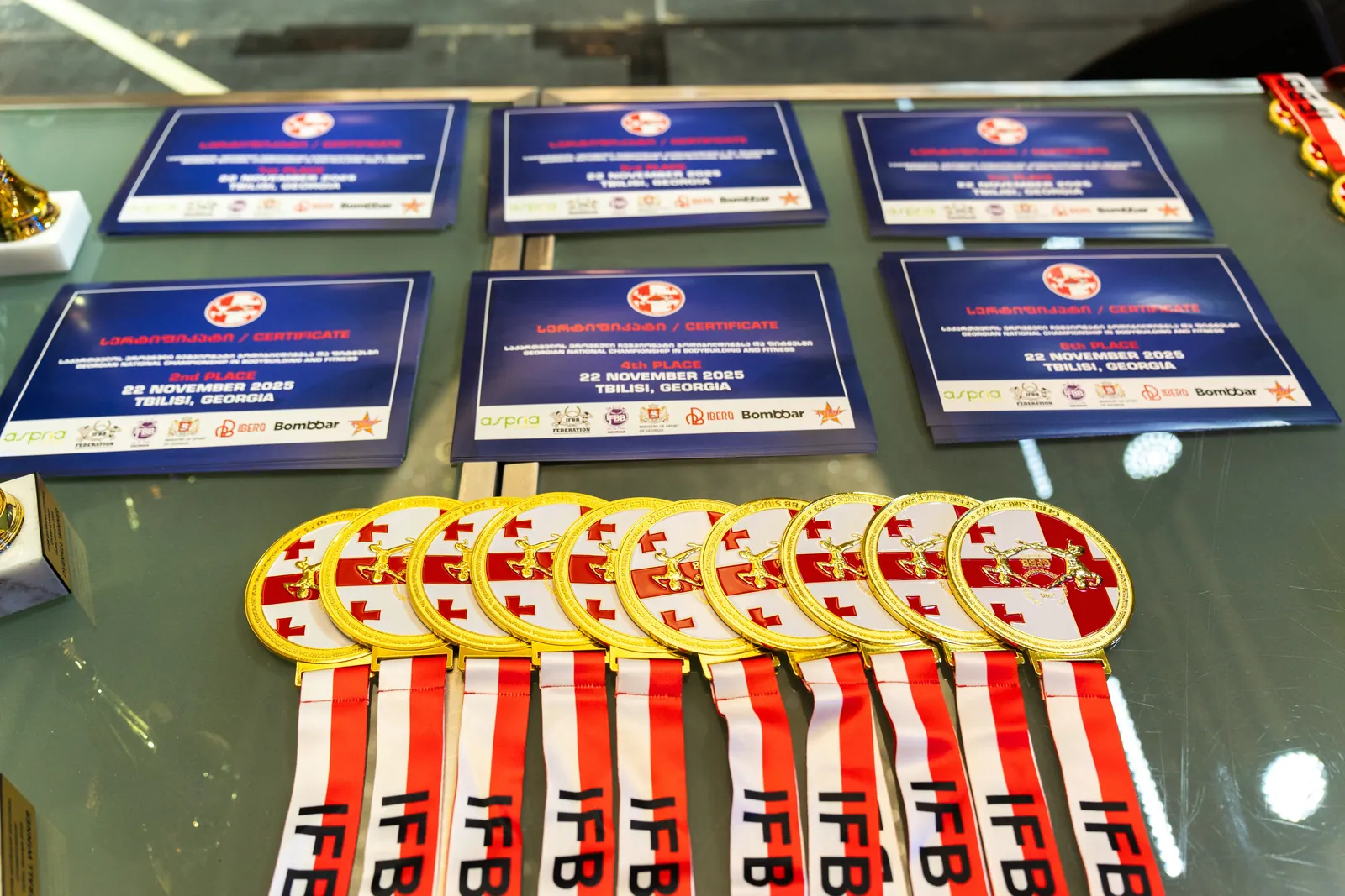 Certificates and gold medals of the Georgian National Championship in Bodybuilding and Fitness